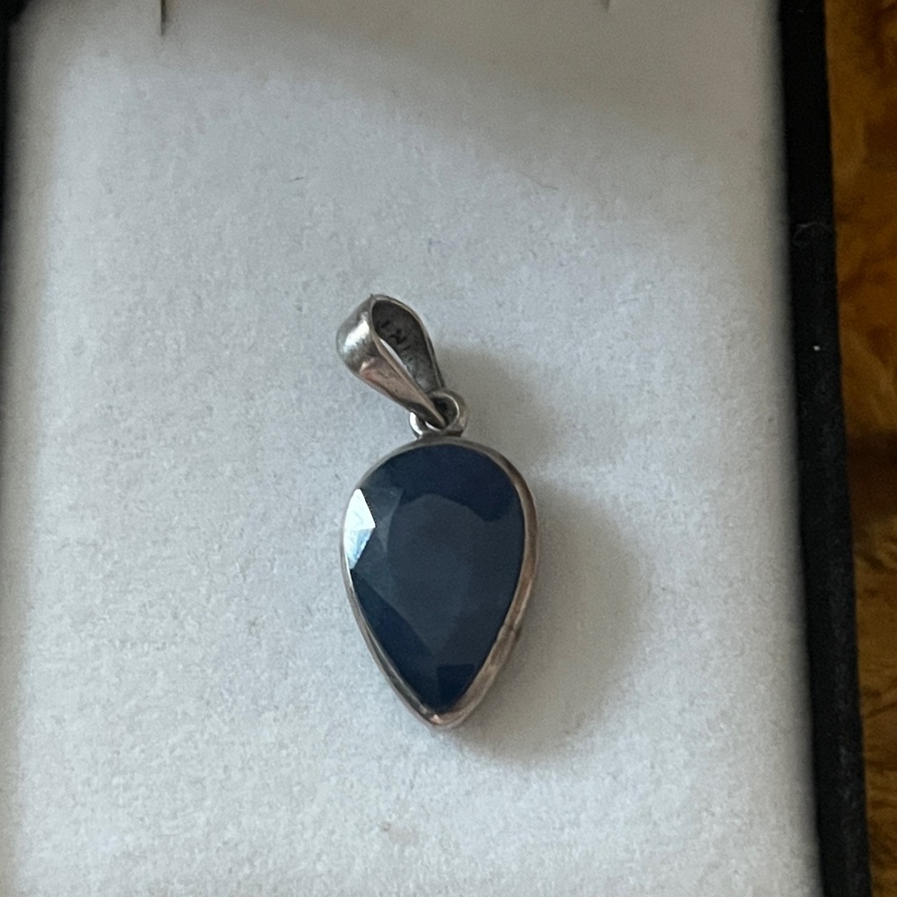 Elegant cut Kynite stone set it sterling pendent
